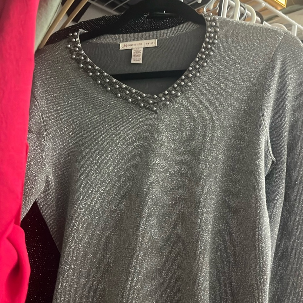 Size petite small blouse never even worn. From White House black market